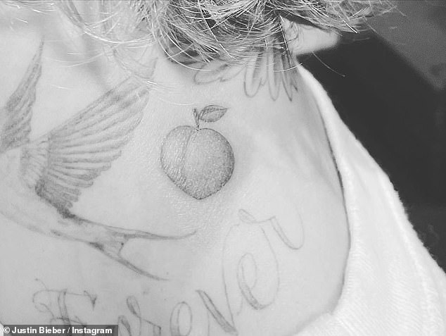 Justin Bieber tattoo peach