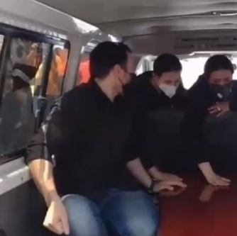 Amy and Donia Samir Ghanem touching Dalal Abdel Aziz’s Coffin for the Last Time