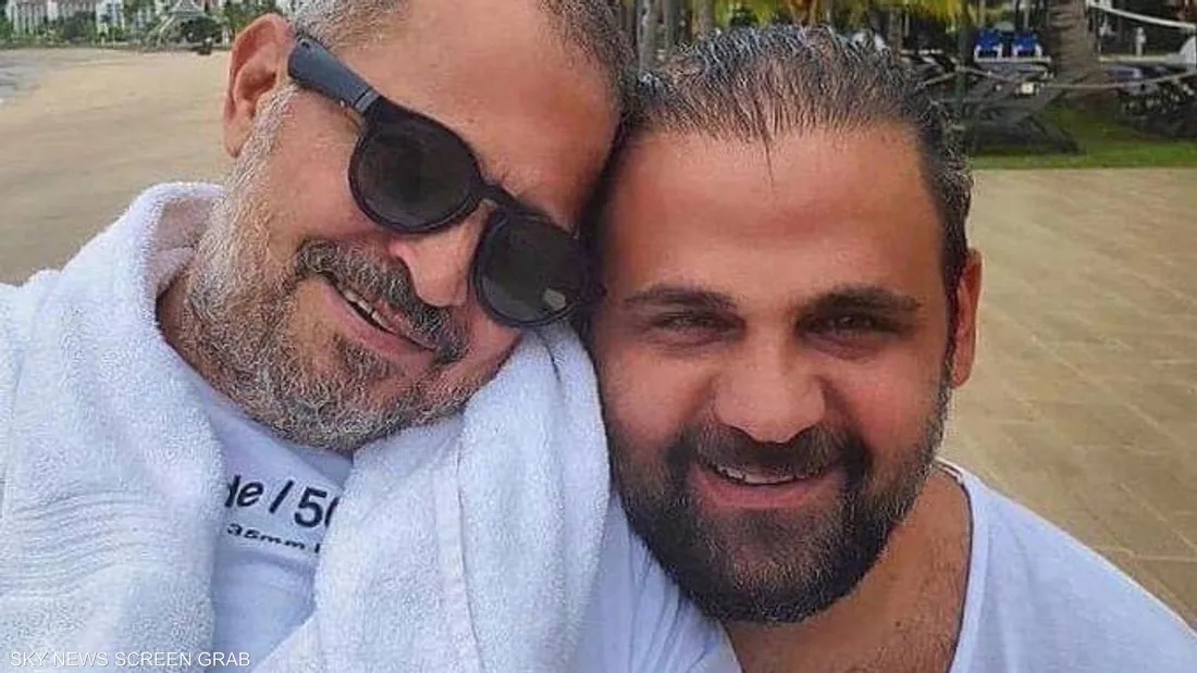 جورج وسوف ونجله في صورة تذكارية