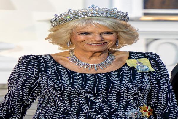 Berlin, Germany - March 29, 2023: close up portrait of the British Queen Consort Camilla in black and silver dress and glittering tiara before the start of the state banquet at Bellevue Palace. Shutterstock image.