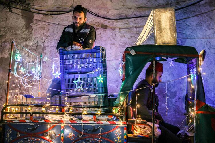 In Pictures: Volunteers and a 'Musaharati' Deliver Pre-Dawn Meals in Syria