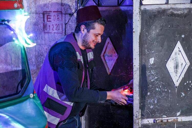 In Pictures: Volunteers and a 'Musaharati' Deliver Pre-Dawn Meals in Syria