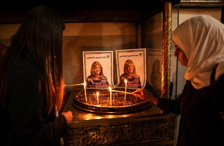 In Pictures: Funerals Held After Palestinian Journalist Killed