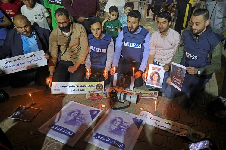 In Pictures: Funerals Held After Palestinian Journalist Killed