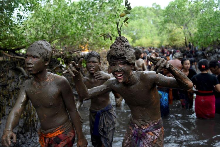 In Pictures: The Balinese Mud Bath Tradition of Mebuug-Buugan