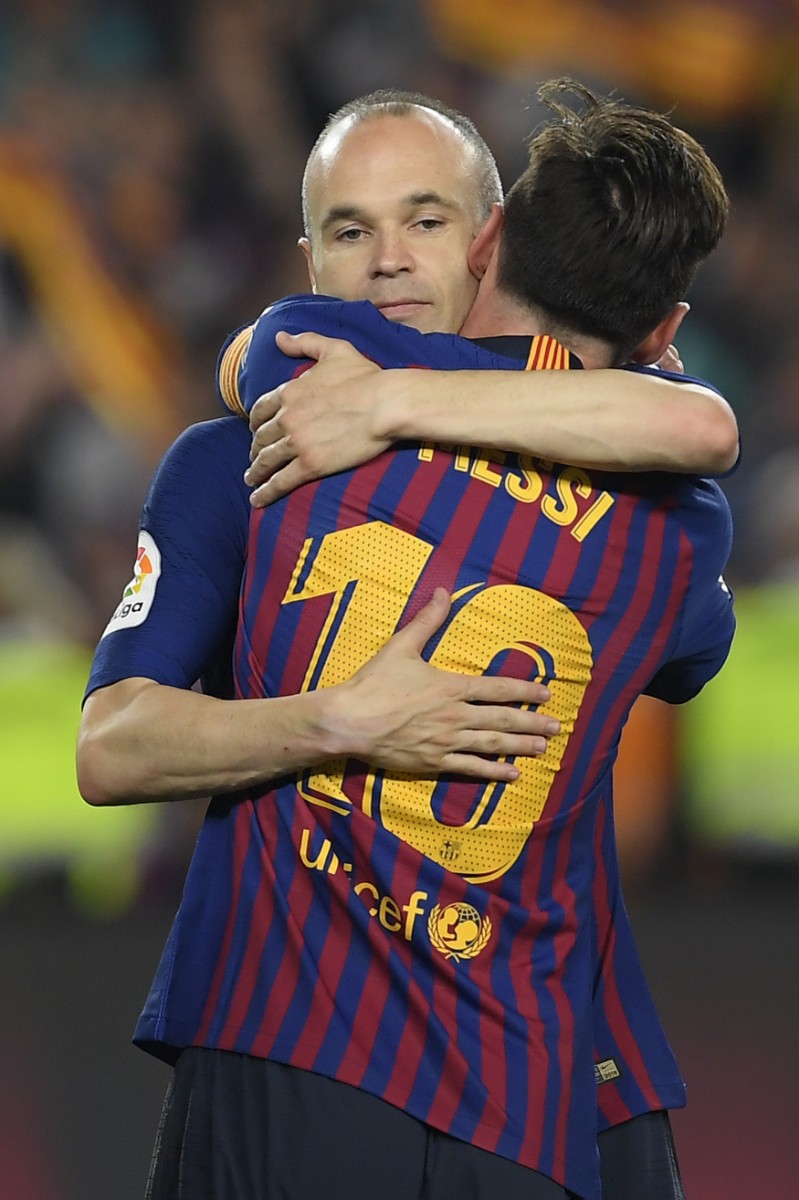 ميسي وإنييستا