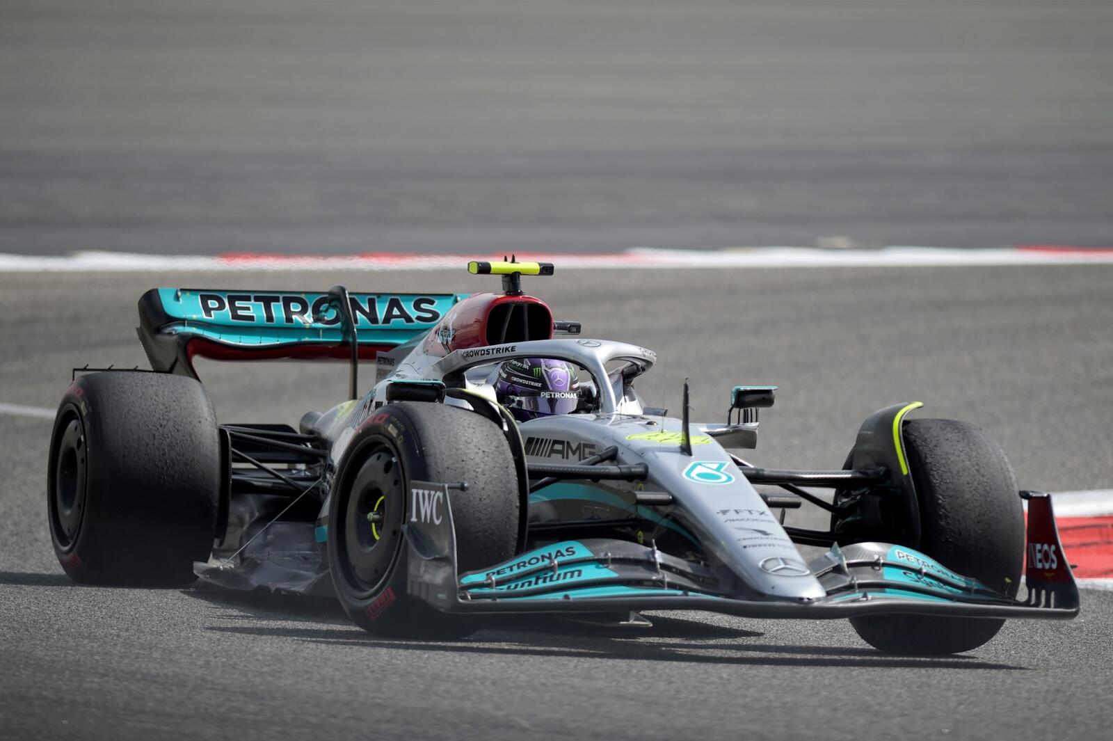 Mercedes' British driver Lewis Hamilton drives during the third day of Formula One (F1) pre-season testing at the Bahrain International Circuit in the city of Sakhir on March 12, 2022. (Photo by Mazen Mahdi / AFP)