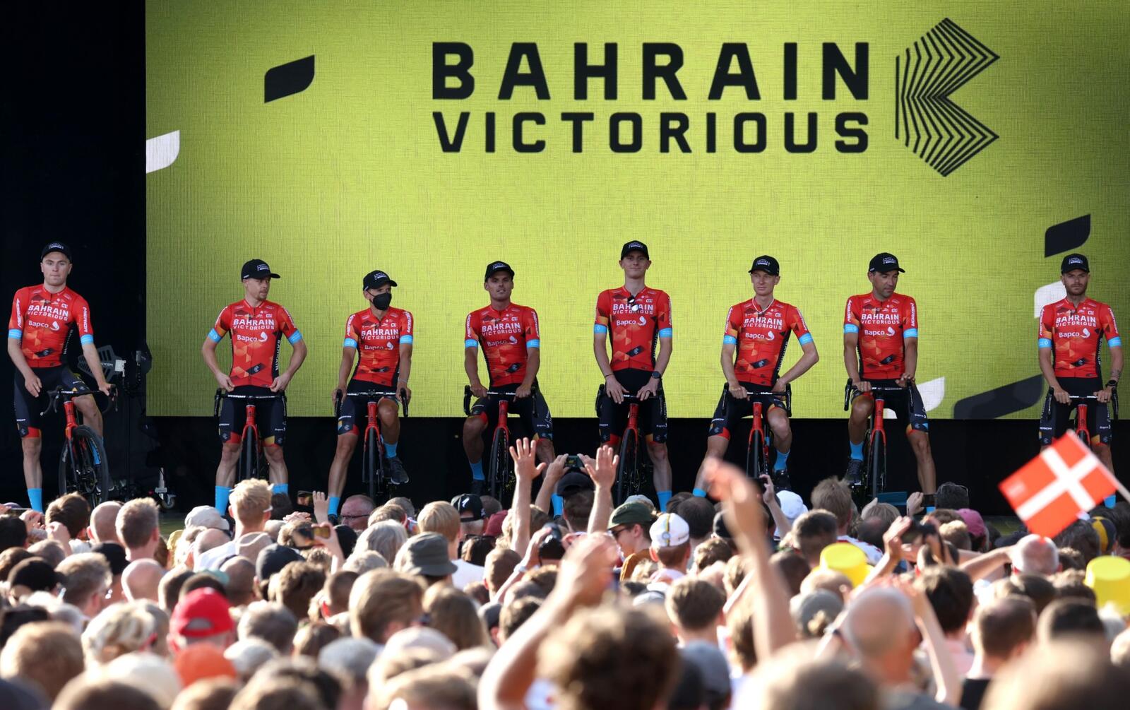 Bahrain Victorious team riders attend the cycling teams' presentation two days ahead of the first stage of the 109th edition of the Tour de France cycling race, in Copenhagen, in Denmark, on June 29, 2022. (Photo by Thomas SAMSON / AFP)