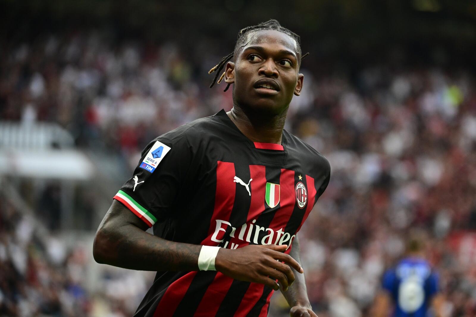 AC Milan's Portuguese forward Rafael Leao celebrates scoring his team's first goal during the Italian Serie A football match between AC Milan and Inter Milan at the San Siro stadium in Milan on September 3, 2022. (Photo by Miguel MEDINA / AFP)