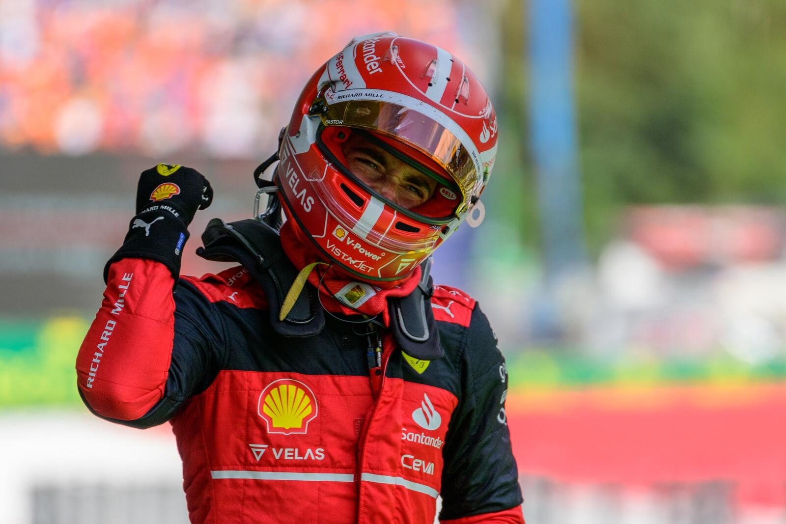 Ferrari's Monegasque driver Charles Leclerc celebrates after winning the Formula One Austrian Grand Prix on the Red Bull Ring race track in Spielberg, Austria, on July 10, 2022. (Photo by Jure Makovec / AFP)
