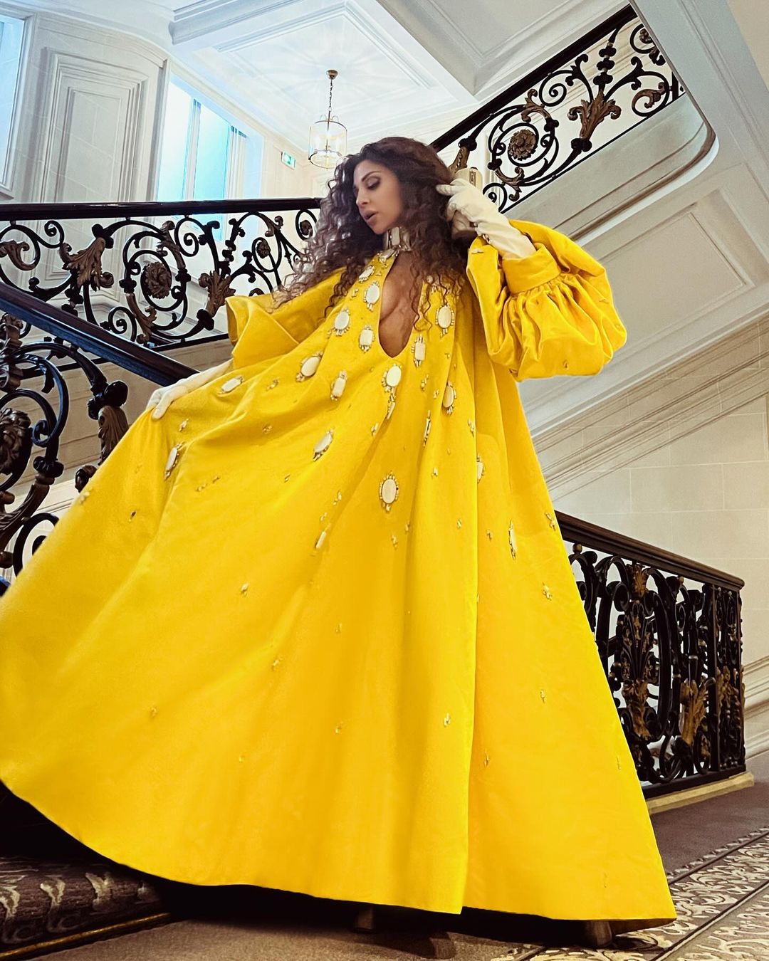 Myriam Fares in revealing yellow dress at Paris Fashion Week | Al Bawaba