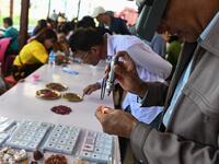 Burrowing deep underground, thousands of informal miners risk their lives to find gleaming red gems as a law change spurs opportunity in Myanmar's "land of rubies". Ye Aung THU / AFP