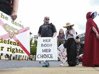 Protestors prepare to participate in a rally against one of the nation's most restrictive bans on abortions on May 19, 2019 in Montgomery, Alabama. Julie Bennett/Getty Images/AFP