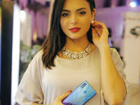 Asma Jalal chose to wear a casual loose cloak but the accessories and make-up were striking