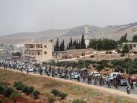 The Syrian goalkeeper turned rebel fighter who starred in an award-winning documentary died on June 8 of wounds sustained fighting regime forces in northwestern Syria, his faction said. OMAR HAJ KADOUR / AFP