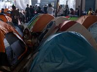Migrants seeking for asylum in the United States are seen in Juventud 2000 migrant shelter in Tijuana, Baja California state, on June 19, 2019, Mexico ahead of World Refugees Day. World Refugee Day is observed June 20 each year internationally to raise awareness of the situation of refugees throughout the world.  (Guillermo Arias / AFP)