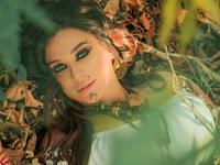 In her latest photos Fawakherji appeared in bright colored clothes and wavy hair Source sulaffawakherji Instagram