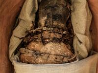 A sarcophagus, part of a new discovery carried out almost 300 meters south of King Amenemhat II’s pyramid at Dahshur necropolis, is exposed near the Bent Pyramid, about 40km (25 miles) south of the Egyptian capital Cairo, during an inaugural ceremony of the pyramid and its satellites, on July 13, 2019. Mohamed el-Shahed / AFP