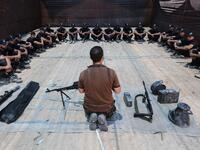 Palestinian military cadets take part in a training session organised by Hamas' military wing, the Ezzedin al-Qassam Brigades, in Gaza City on July 20, 2019.  MAHMUD HAMS / AFP