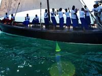 A Kuwaiti diver searches for shells containing pearls during the annual pearl diving season on July 30, 2019 off the coast of the port city of Khairan, 100 kms (62miles) south of Kuwait City Yasser Al-Zayyat / AFP