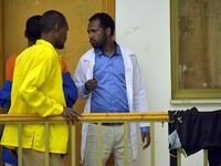 Welday Hagos (R), director of the Substance Rehabilitation Centre, the only facility in Ethiopia that offers long-term drug and alcohol addiction treatment, speaks with patients in Mekele on July 4, 2019. MICHAEL TEWELDE / AFP