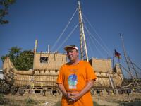 Abora IV expedition leader German archeologist Dominique Goerlitz speaks to AFP in front of the 14-meter long sailing reed boat in the town of Beloslav, Bulgaria, on July 25, 2019. NIKOLAY DOYCHINOV / AFP