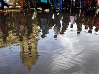 Protestors and social activists take part in a protest in Kolkata on August 6, 2019, in reaction to the Indian government scrapping Article 370 that granted a special status to Jammu and Kashmir.  Dibyangshu SARKAR / AFP