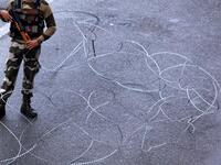 A security personnel stands guard at a roadblock in Jammu on August 7, 2019. A protester died after being chased by police during a curfew in Kashmir's main city, left in turmoil by an Indian government move to tighten control over the restive region, a police official said on August 7. Rakesh BAKSHI / AFP