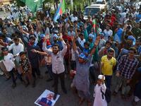 Students of Islami Jamiat-e-Talaba (IJT), a wing of religious political party Pakistan Jamaat-e-Islami (JI), chant anti-Indian slogans during a protest near the Pakistan-India Wagah border.  ARIF ALI / AFP