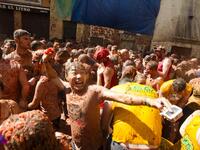 Revellers covered in tomato pulp take part in the annual "Tomatina" festival in the eastern town of Bunol, on August 28, 2019. JAIME REINA / AFP
