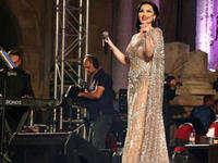 Diana Karazon chose a silver and beige dress for her concert in Jerashs southern theater Source dianakarazonw Instagram