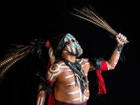 Mexican dancer Jorge de Jesus Trujillo, who represents "Mictlantecuhtli" (deity of the dead in the Mexica mythology) in a pre-Columbian ballgame called "Ulama" -in Nahuatl indigenous language-, poses for a photograph during a photo session at the FARO Poniente cultural center in Mexico City on August 21, 2019. Omar TORRES / AFP