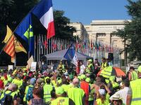 Members of the 'Yellow vests' mouvement protest in front of the United Nations office in Geneva against the police violence in France and the use of the LBD40 weapon manufactured in Switzerland, on August 31, 2019 in Geneva. ELOI ROUYER / AFP