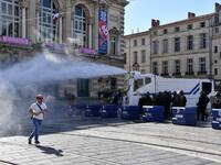 French anti-riot police officers use a water canon during an anti-government demonstration called by the "Yellow Vests" (Gilets Jaunes) movement on September 7, 2019 in Montpellier, southern France. Pascal GUYOT / AFP