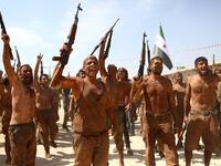 Syrian Turkish-backed fighters from al-Mutasim Brigade take part in a training at a camp near the town of Marea in Syria's northern Aleppo district, on September 12, 2019. Nazeer Al-khatib / AFP