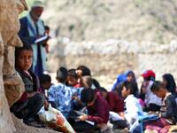 Yemeni school children attend an open-air class at their unfinished school in Yemen Ahmad AL-BASHA / AFP