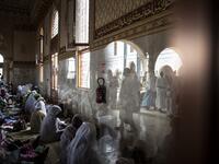 Worshippers enter the Great Mosque of the Mourides on September 27, 2019 in Dakar, ahead of its inauguration. Senegal's influential Mouride Brotherhood will inaugurate a 30,000-capacity mosque in the capital Dakar, said to be the largest in West Africa. JOHN WESSELS / AFP