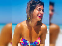 Menna enjoying her time on the beach Source @manoushafadali instagram