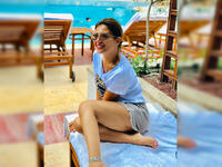 Menna enjoying her time by the pool side source @manoushafadali instagram