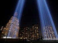 People look toward the Tribute in Light, lit up to commemorate the 18th anniversary of the September 11, 2001 attacks in New York, on Tuesday (Twitter)