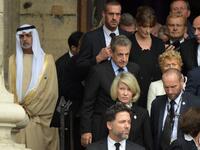 France's former President Nicolas Sarkozy (C) leaves after attending a church service for former French President Jacques Chirac at the Saint-Sulpice church in Paris on September 30, 2019. Former French President Jacques Chirac died on September 26, 2019 at the age of 86. Eric FEFERBERG / AFP