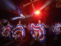 Moulin Rouge dancers perform during the celebration of the 130th anniversary of the French oldest cabaret, on October 6, 2019 in Paris.  GEOFFROY VAN DER HASSELT / AFP