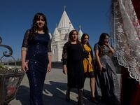 The new Yazidi Temple in the village of Aknalich, 35 kilometres from the Armenian capital Yerevan, on October 11, 2019 Worshippers kiss the marble walls and gaze at an ornate peacock inlaid with multi-coloured stones inside the world's largest Yazidi temple, which has opened in Armenia.  KAREN MINASYAN / AFP