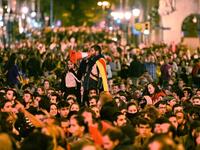 A demonstrator uses a traffic cone as megaphone during a protest in front of the Spanish national police headquarters in Barcelona on October 20, 2019. Nearly 600 people have been injured in clashes with police since the protests started in Catalonia. Demonstrators have set fire to cars and garbage bins and thrown rocks at police, who have responded by using their batons and firing rubber bullets. JOSE JORDAN / AFP