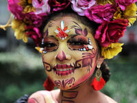 A woman dressed as Catrina takes part in the Catrinas Parade along Reforma Avenue in Mexico City Claudio Cruz / AFP / Getty