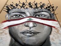 A graffiti is sprayed on a wall in Lebanon's capital Beirut on November 5, 2019. Since October 17, the chanting of tens of thousands of Lebanese denouncing the political elite have shaken the normally staid district around two Beirut squares, Martyrs' and Riad Al Solh. JOSEPH EID / AFP