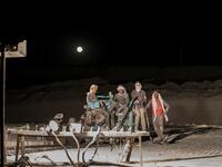 Labourers, some wearing protective gear, pose for a picture by a full moon while working late at night at the "White Mountain" limestone extraction quarry site near Egypt's southern city of Minya, some 265 kilometres south of the capital, on November 13, 2019. Covered in fine white dust, labourers at the so-called "White Mountain" off Minya toil in shifts amidst brutal conditions with little workplace safety for paltry pay. They handle dangerous machinery with finesse, and shrug off the dangers of a job whe