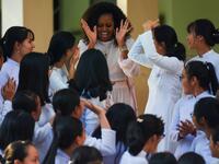 Former US First Lady Michelle Obama meets Vietnamese students in Can Giuoc district, Long An province on December 9, 2019. Michelle Obama and Julia Roberts visit to promote girls' education in Vietnam. Nhac NGUYEN / AFP