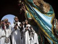 Gnawa refers to a "set of musical productions, fraternal practices and therapeutic rituals where the secular mixes with the sacred", according to the nomination submitted by Morocco. Often dressed in colourful outfits, Gnawa musicians play the guenbri, a type of lute with three strings, accompanied by steel castanets called krakebs. FADEL SENNA / AFP