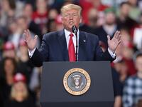 While Trump spoke at the rally the House of Representatives voted, mostly along party lines, to impeach the president for abuse of power and obstruction of Congress, making him just the third president in U.S. history to be impeached. Scott Olson/Getty Images/AFP